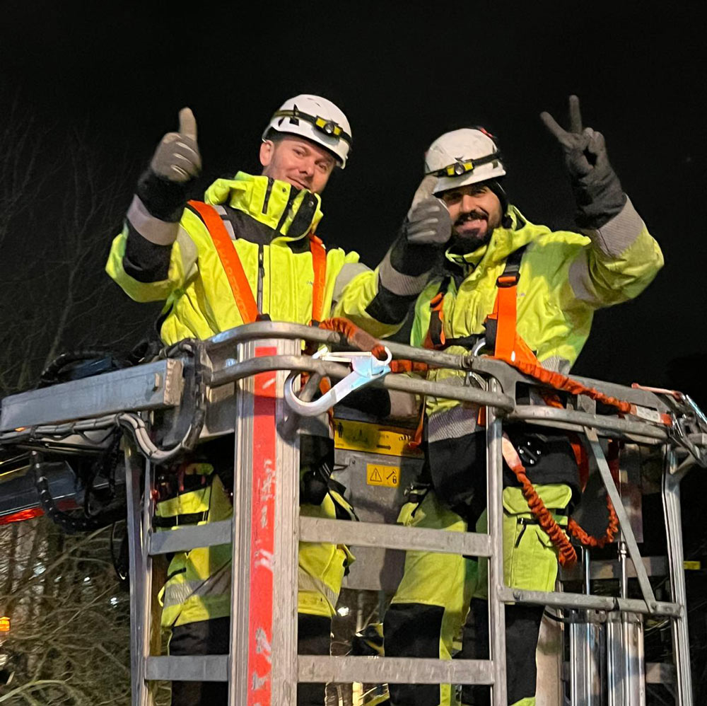 Two colleagues in a skylift